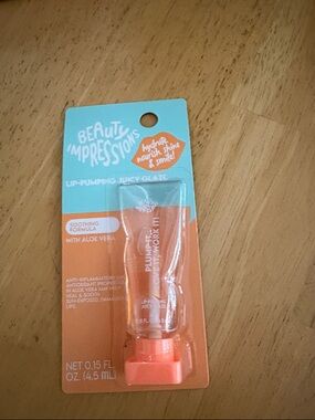 Impressions Orange and Teal Lip-Pumping Juicy Glaze with Aloe Vera
